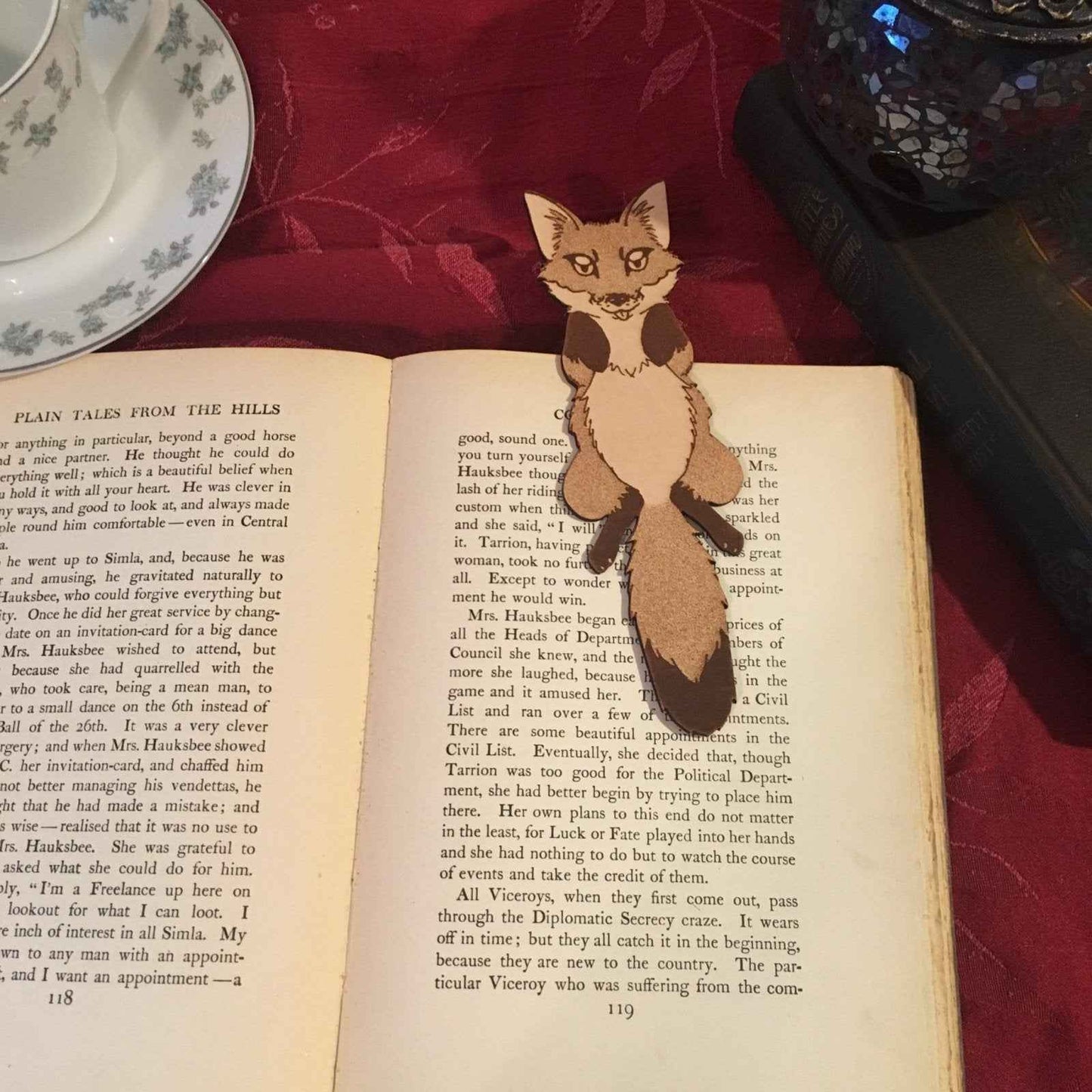Leather red fox bookmark on the pages of an open book. Leather Red Fox Bookmark - Fun Gift for Fox Lovers Bookmarks Raven King Crafts