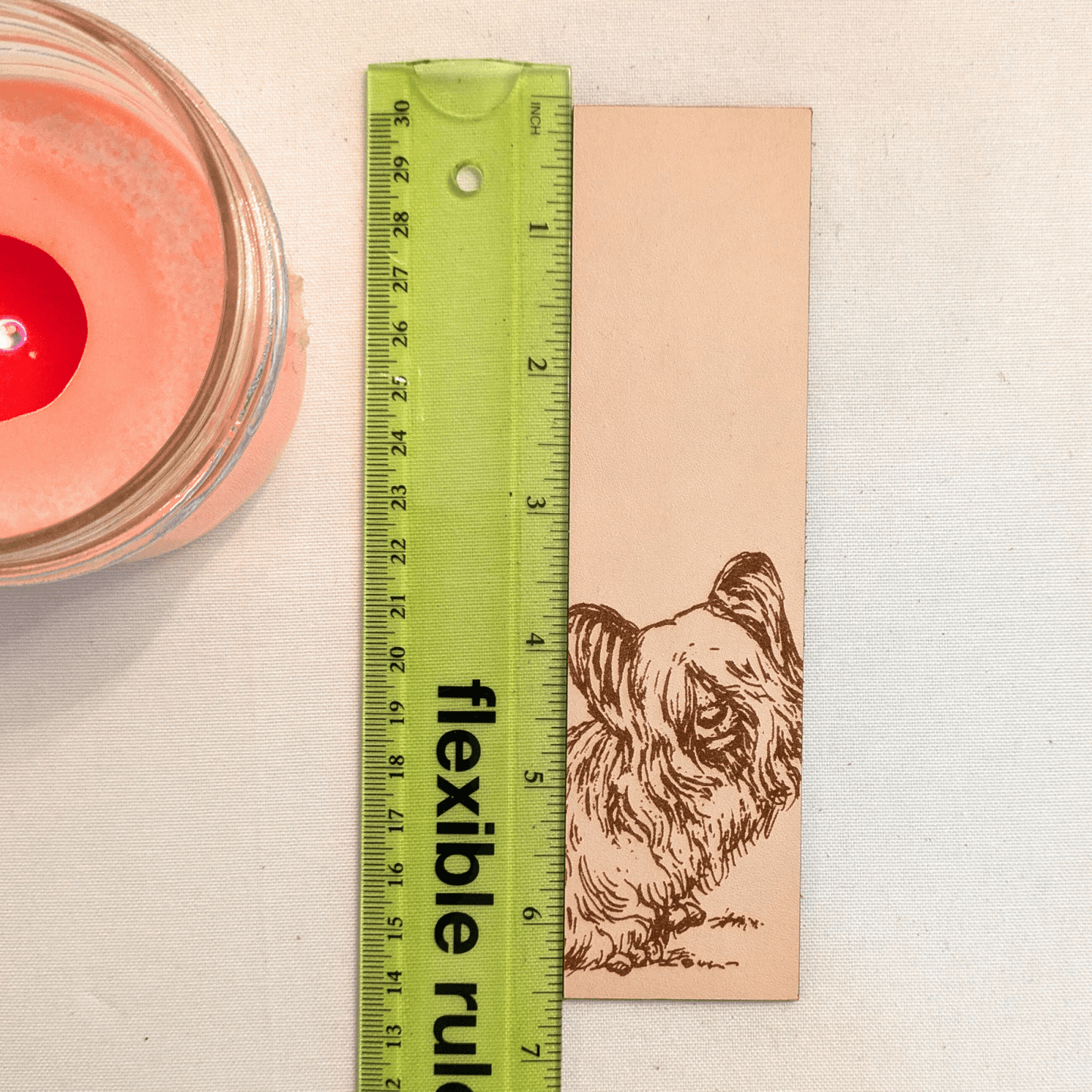 The Scottish terrier bookmark next to a ruler for scale. Leather Skye Terrier Bookmark (toy dog) Bookmarks Raven King Crafts Leather Skye Terrier Bookmark (toy dog) - Pick one or get both! Bookmarks Raven King Crafts