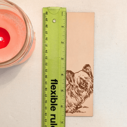 The Scottish terrier bookmark next to a ruler for scale. Leather Skye Terrier Bookmark (toy dog) Bookmarks Raven King Crafts Leather Skye Terrier Bookmark (toy dog) - Pick one or get both! Bookmarks Raven King Crafts