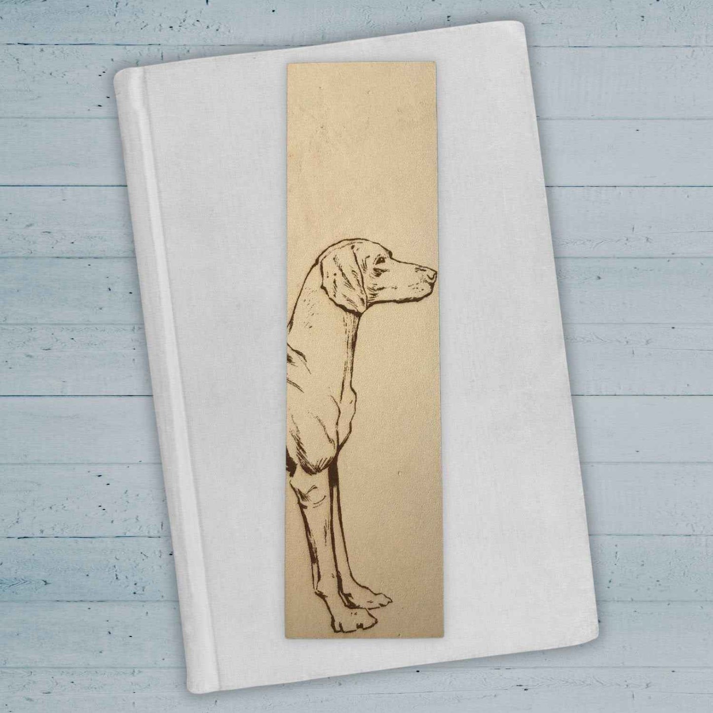 This leather bookmark is engraved with the art of a Vizsla dog on it. Leather Vizsla Bookmark Bookmarks Raven King Crafts