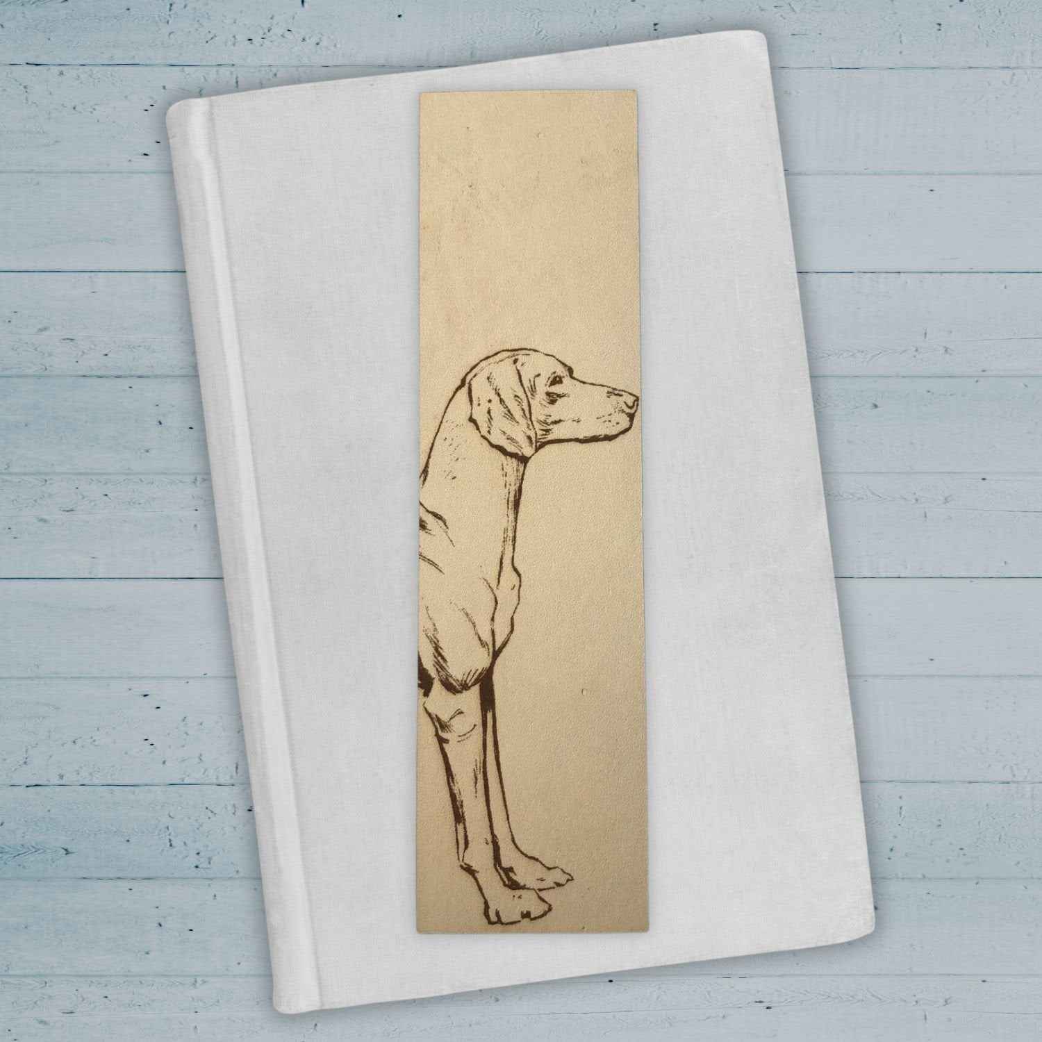 This leather bookmark is engraved with the art of a Vizsla dog on it. Leather Vizsla Bookmark Bookmarks Raven King Crafts