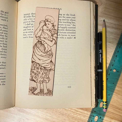 A wonderful mother and child bookmark made of leather. Mother and Child Leather Bookmark Bookmarks Raven King Crafts