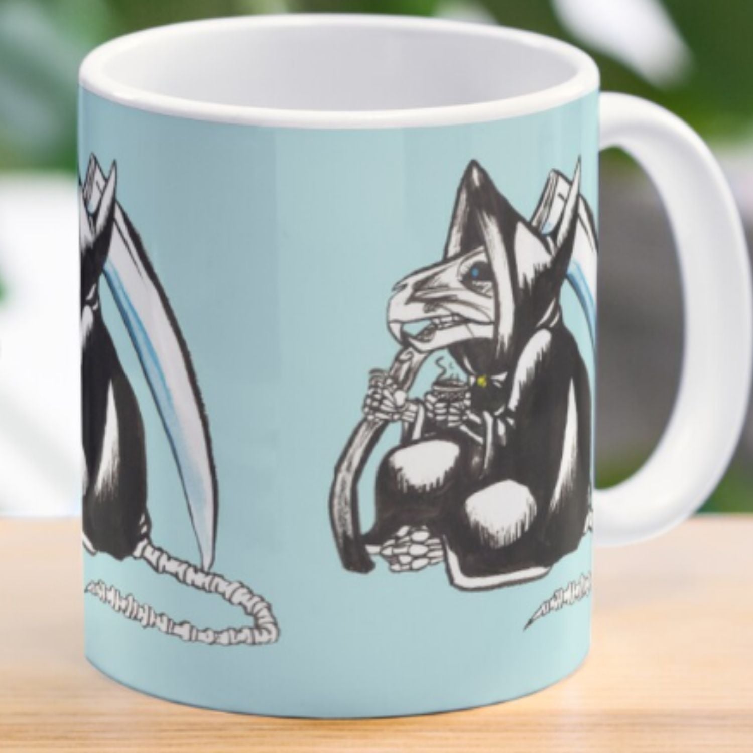 A photo of a mug with a rat grim reaper on it. 