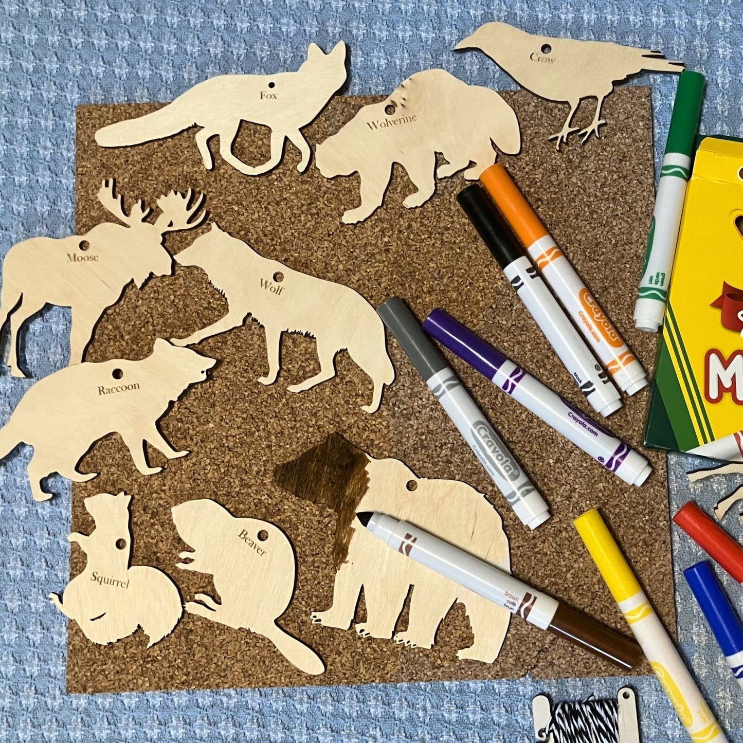 The North American wildlife cutouts next to the markers you can include in your kit. North America Wildlife Ornament (Cutout) Kit Art & Craft Kits Raven King Crafts
