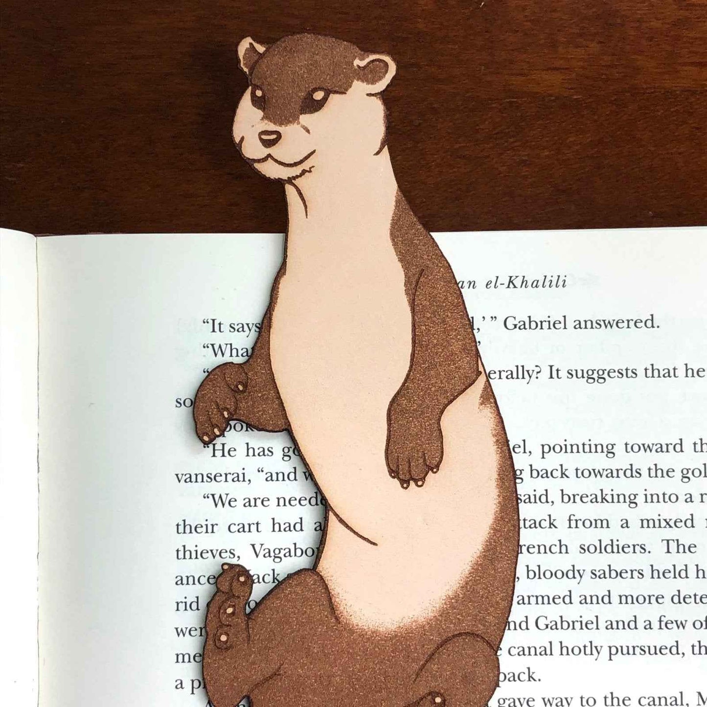 This adorable leather bookmark shaped like an otter. Otter Bookmark Bookmarks Raven King Crafts