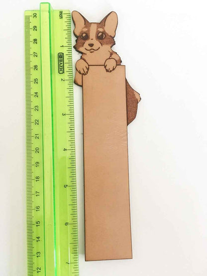 Pembroke Welsh Corgi Bookmark next to a ruler for scale. Pembroke Welsh Corgi Bookmark Bookmarks Raven King Crafts