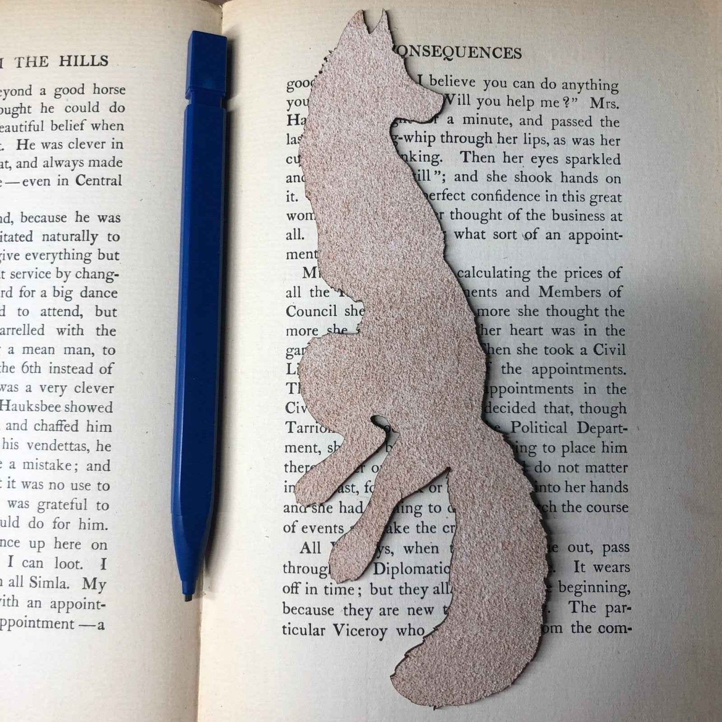 The backs of the leather bookmarks are unfinished and you can see the leather grain. Red Fox Bookmark - Leather Bookmarks Raven King Crafts