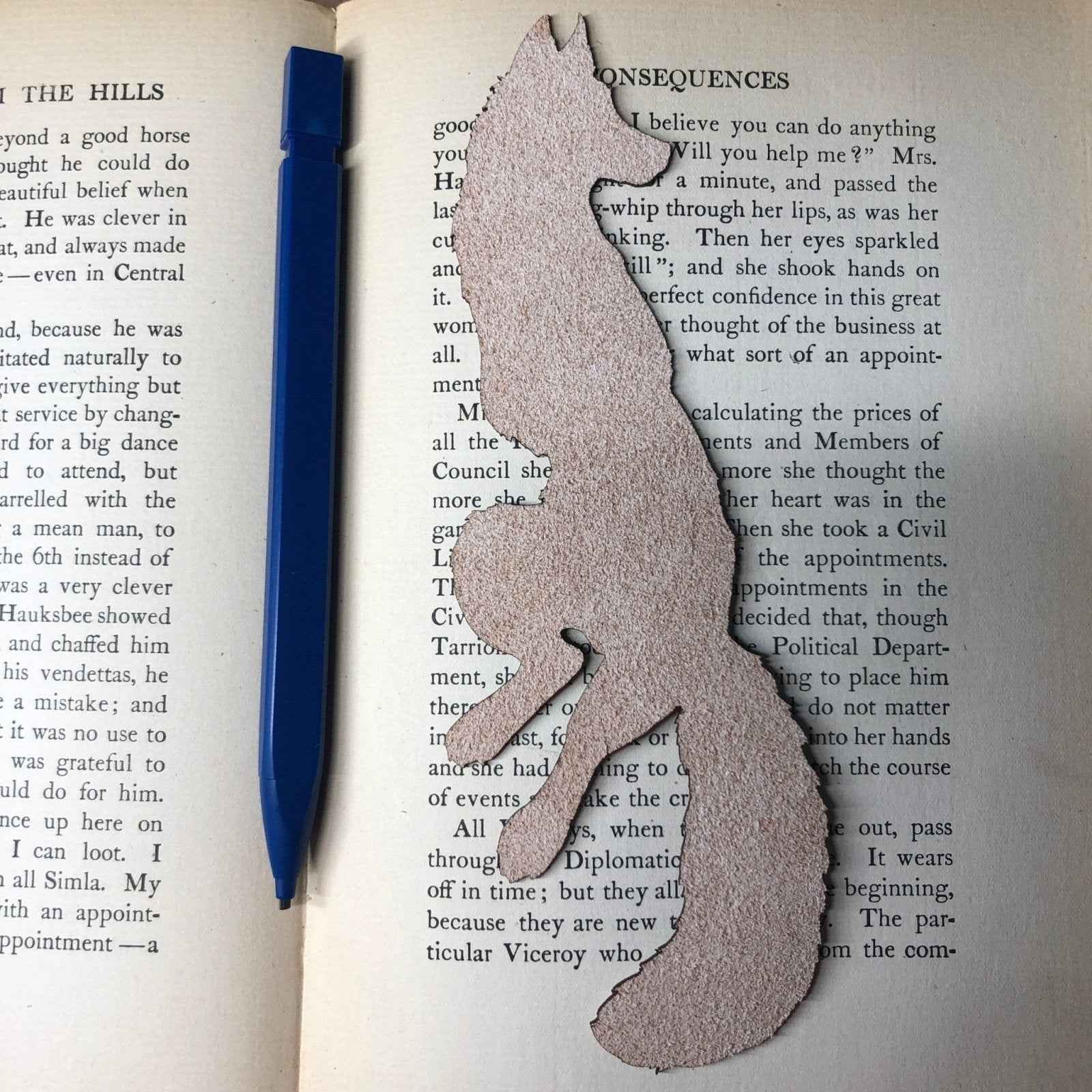 The backs of the leather bookmarks are unfinished and you can see the leather grain. Red Fox Bookmark - Leather Bookmarks Raven King Crafts