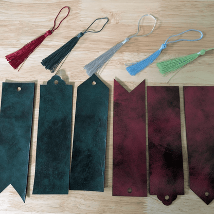 The green and black as well as red and black leather bookmarks. The top is the tassel choices. Red or Green Leather Bookmarks with Tassel Bookmarks Raven King Crafts