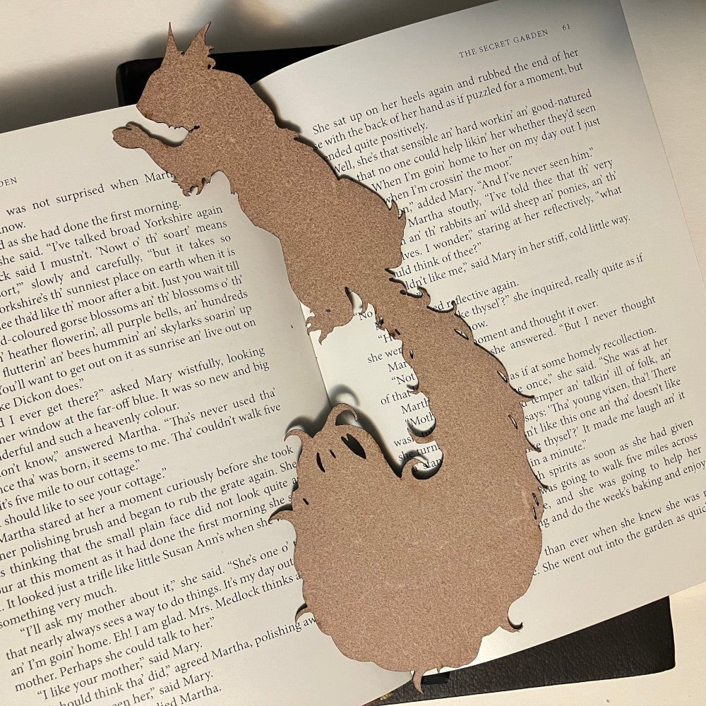 The back of the squirrel bookmark is unfinished. Red Squirrel Bookmark - Leather Bookmarks Raven King Crafts