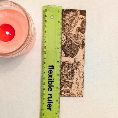 Regal Queen In Tower Leather Bookmark next to a ruler for scale. Regal Queen In Tower Leather Bookmark Bookmarks Raven King Crafts