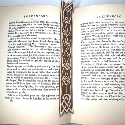 A leather bookmark with the antique art of Celtic ribbon on it. Ribbon Shaped Celtic Bookmark - Leather Bookmarks Raven King Crafts