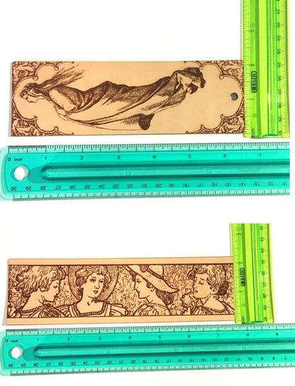 The historical bookmark next to a ruler for scale.