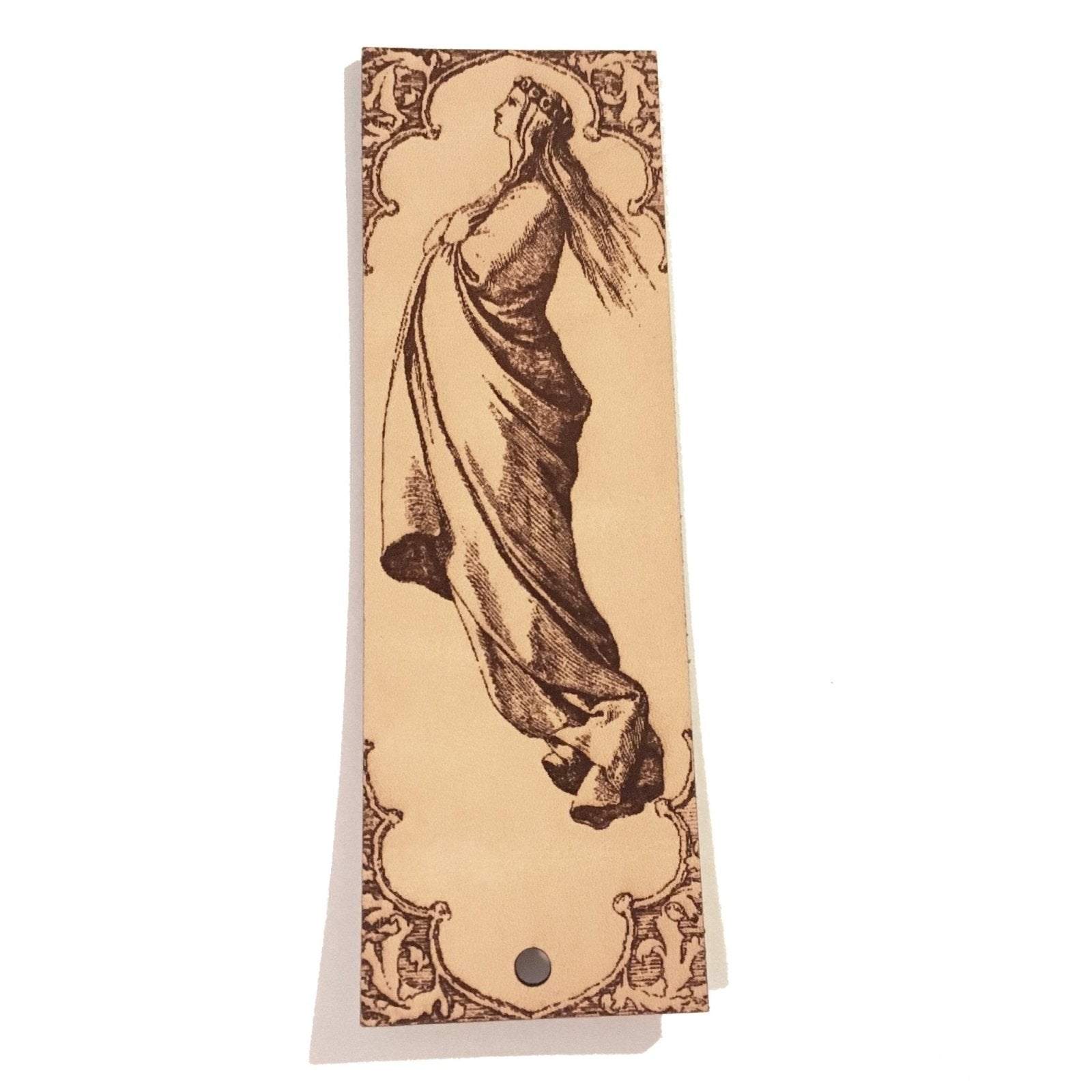 The leather bookmark of a floating woman with a robe, long hair and a crown.