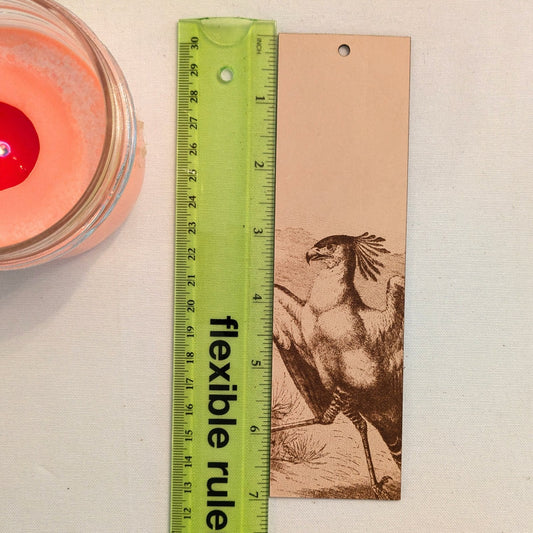 Secretary Bird Bookmark next to a ruler for scale. Secretary Bird Bookmark - Leather Bookmarks Raven King Crafts
