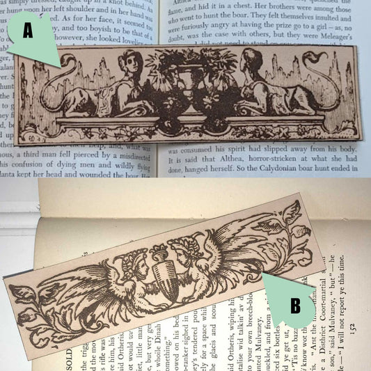 A photo of both sphinx bookmarks. The top sphinx bookmark has 2 sphinxes without wings. The bottom has 2 with wings.