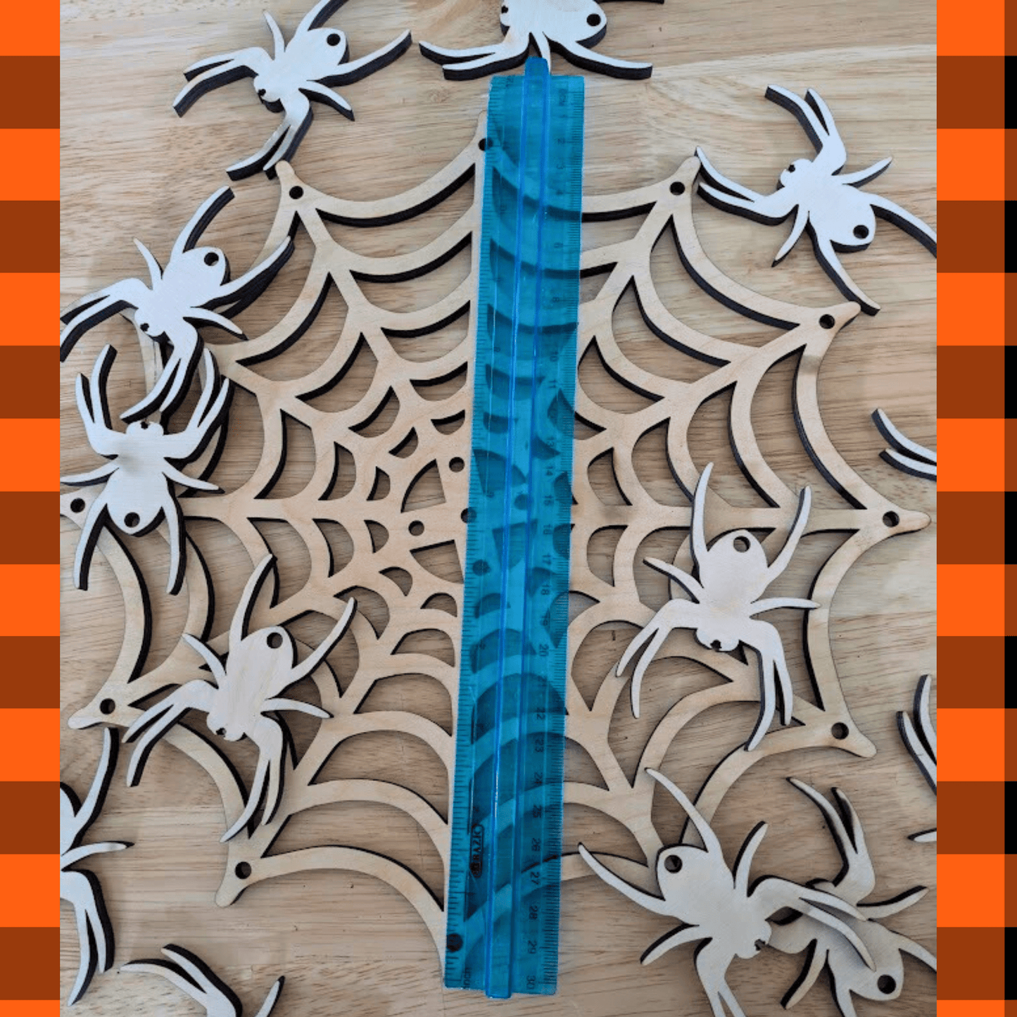 A ruler on the spider web mobile to show the size. Spider Web Mobile Kit Art & Craft Kits Raven King Crafts