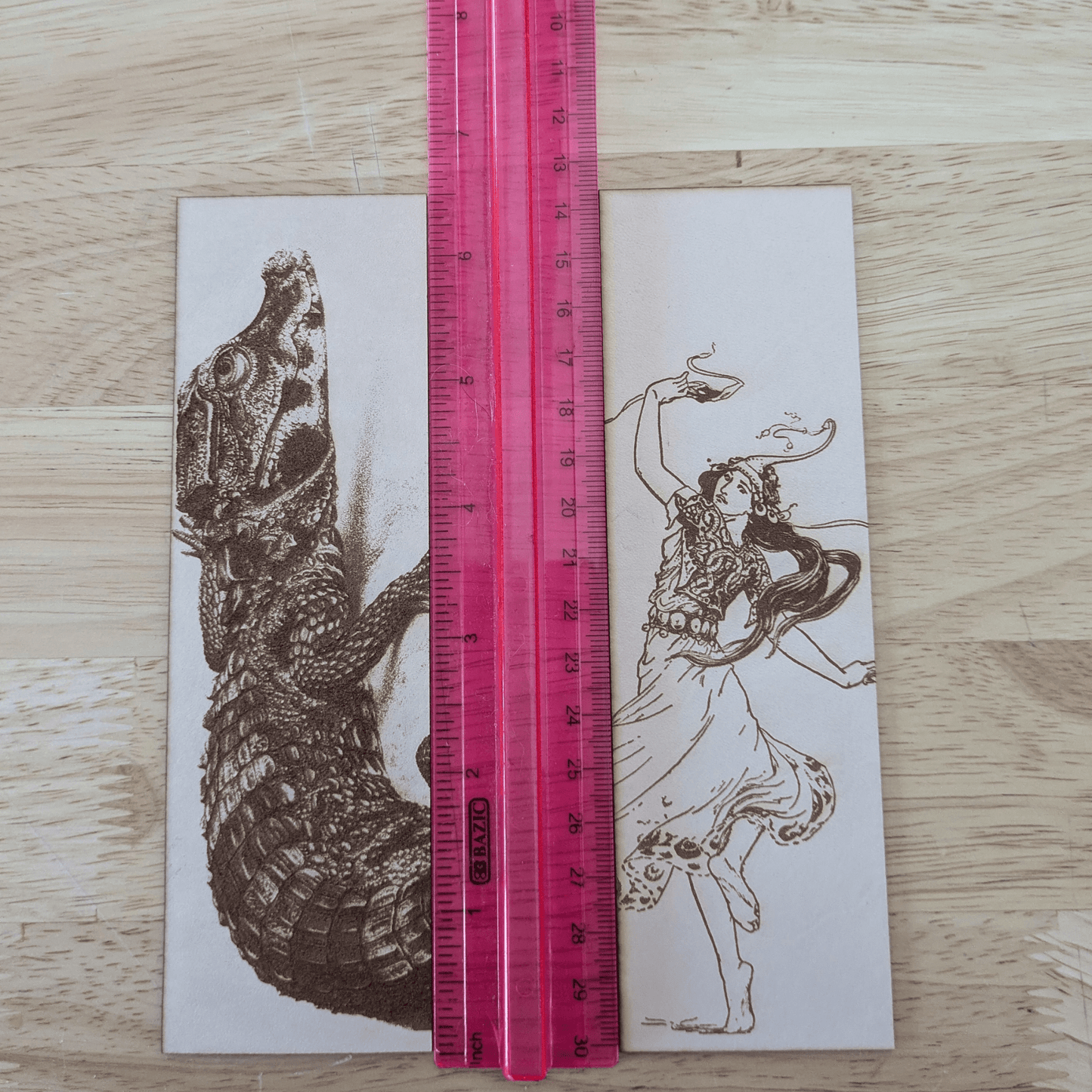 The woman dancing bookmark and dwarf crocodile bookmark next to a ruler for scale. West African Crocodile - Dwarf Crocodile Leather Bookmark Bookmarks Raven King Crafts