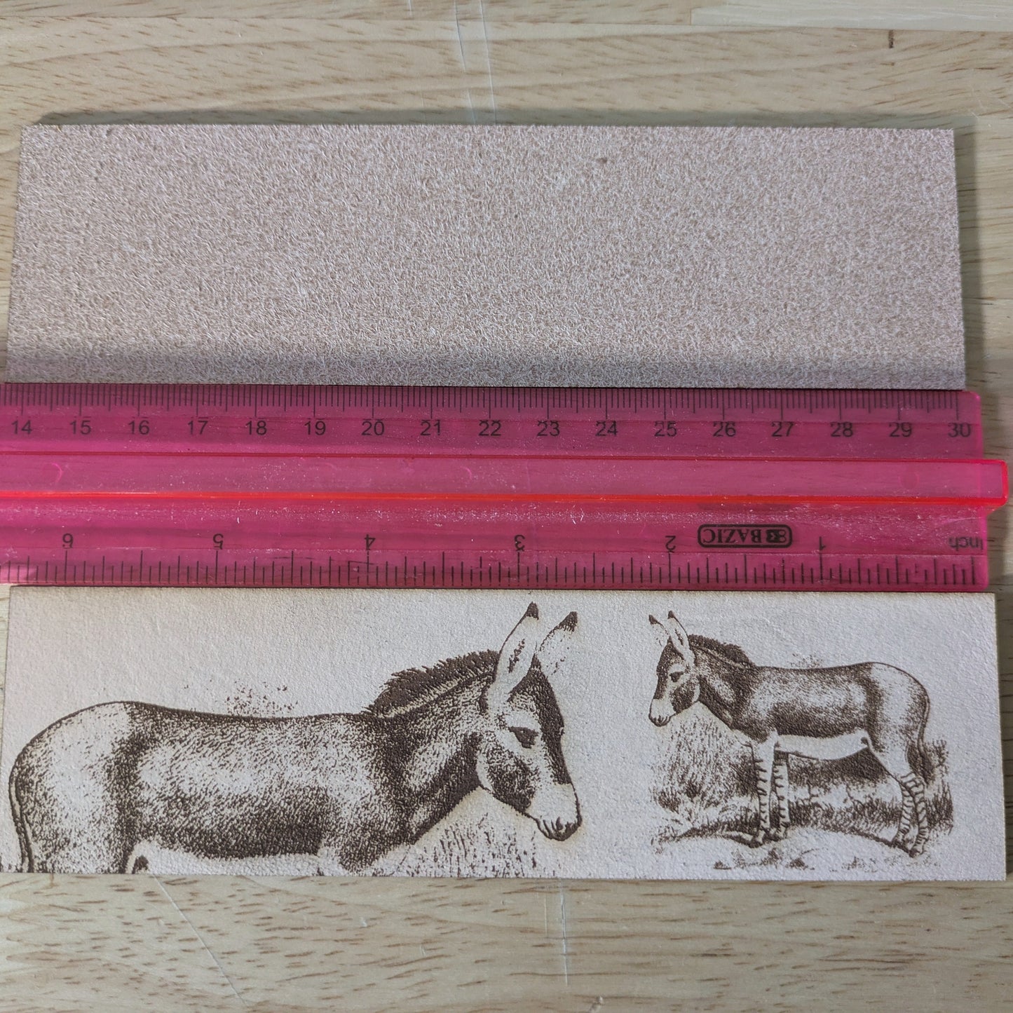 The leather donkey bookmark by a ruler. Wild Donkey - Leather Bookmark Bookmarks Raven King Crafts