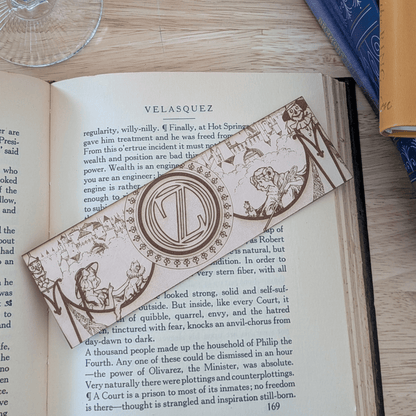 A leather bookmark engraved with art from the Wizard of OZ bookmarks. Wizard of Oz Bookmark Bookmarks Raven King Crafts