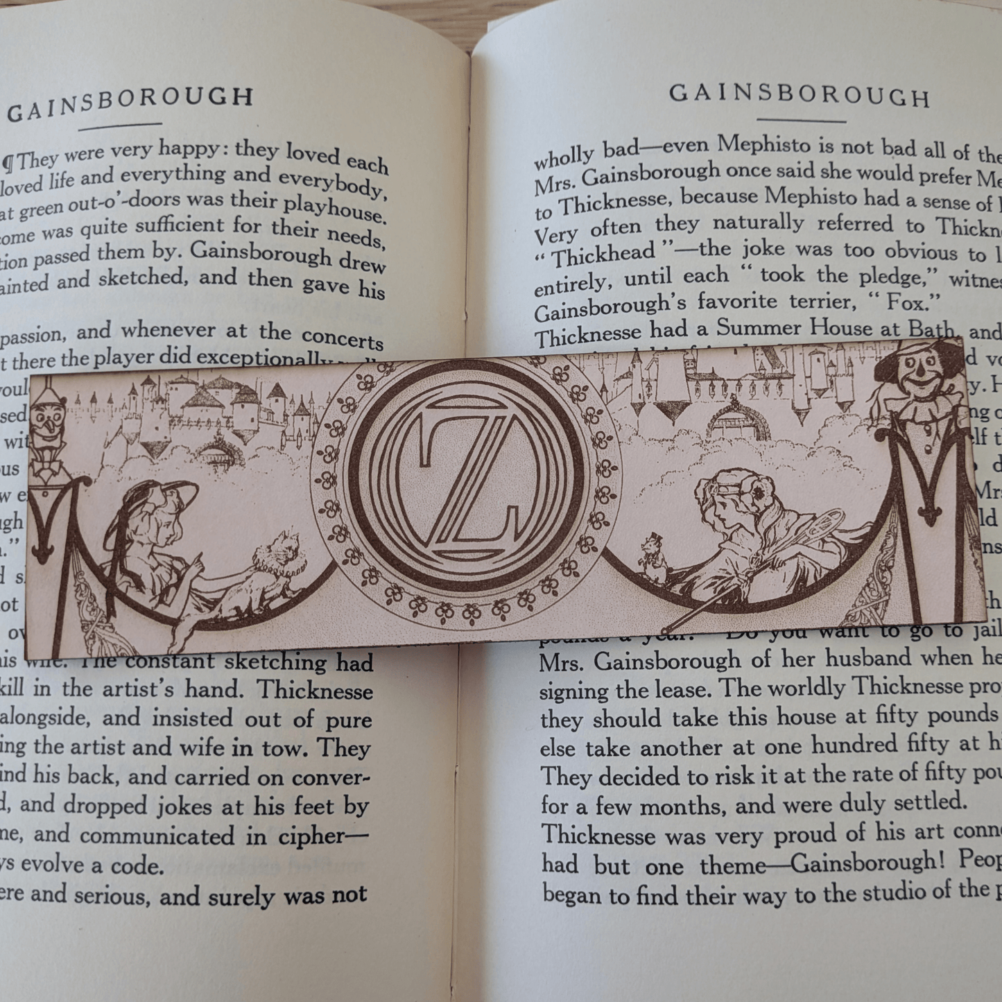 A leather bookmark engraved with art from the Wizard of OZ bookmarks. Wizard of Oz Bookmark Bookmarks Raven King Crafts