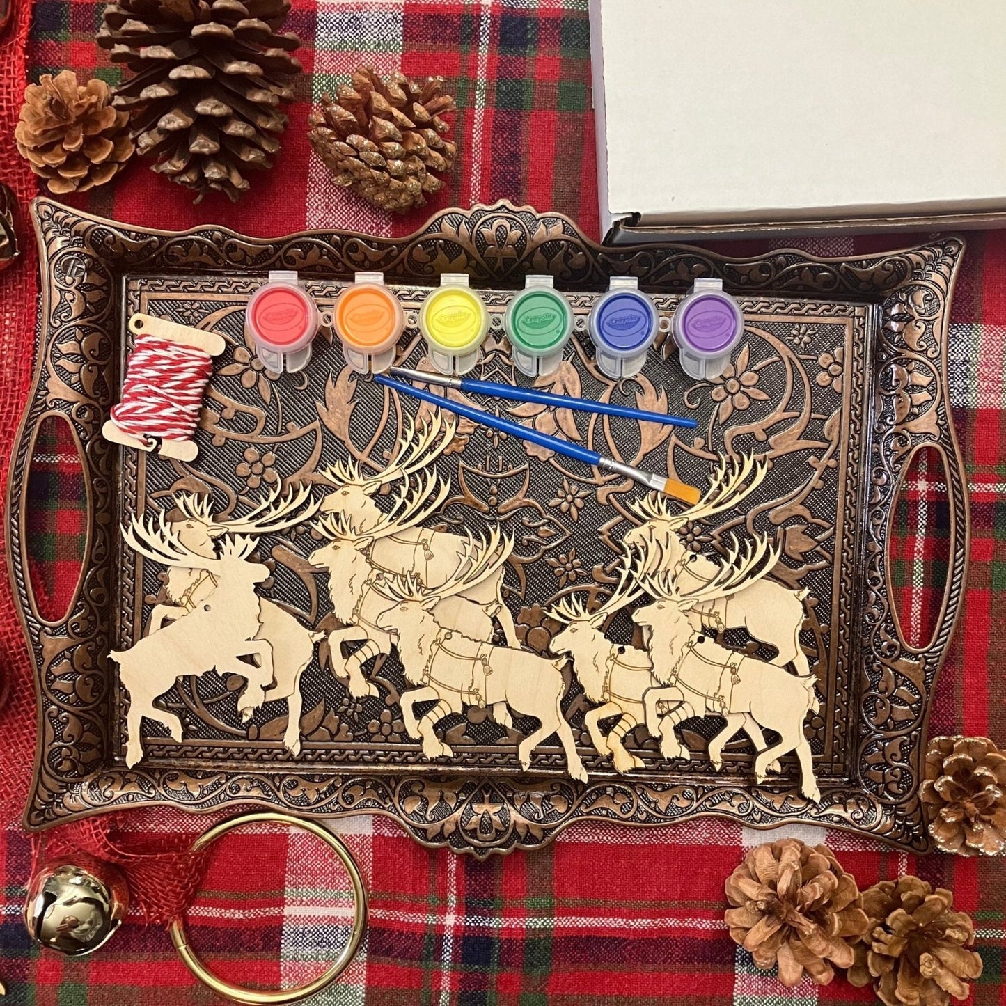 Wooden diy Reindeer ornament kit, 8 reindeer ornaments, paints, brushes and string.