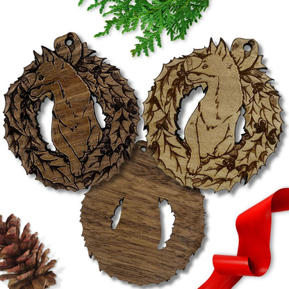 The wooden fox ornaments in this picture show the dark and the light wood varieties. It also shows the back of the ornament is not engraved with the design. Wood Fox Ornaments Ornament Raven King Crafts
