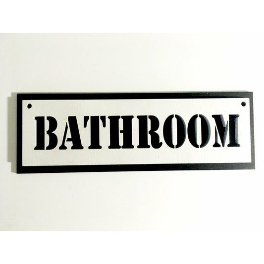 A black and white plywood sign that says bathroom.