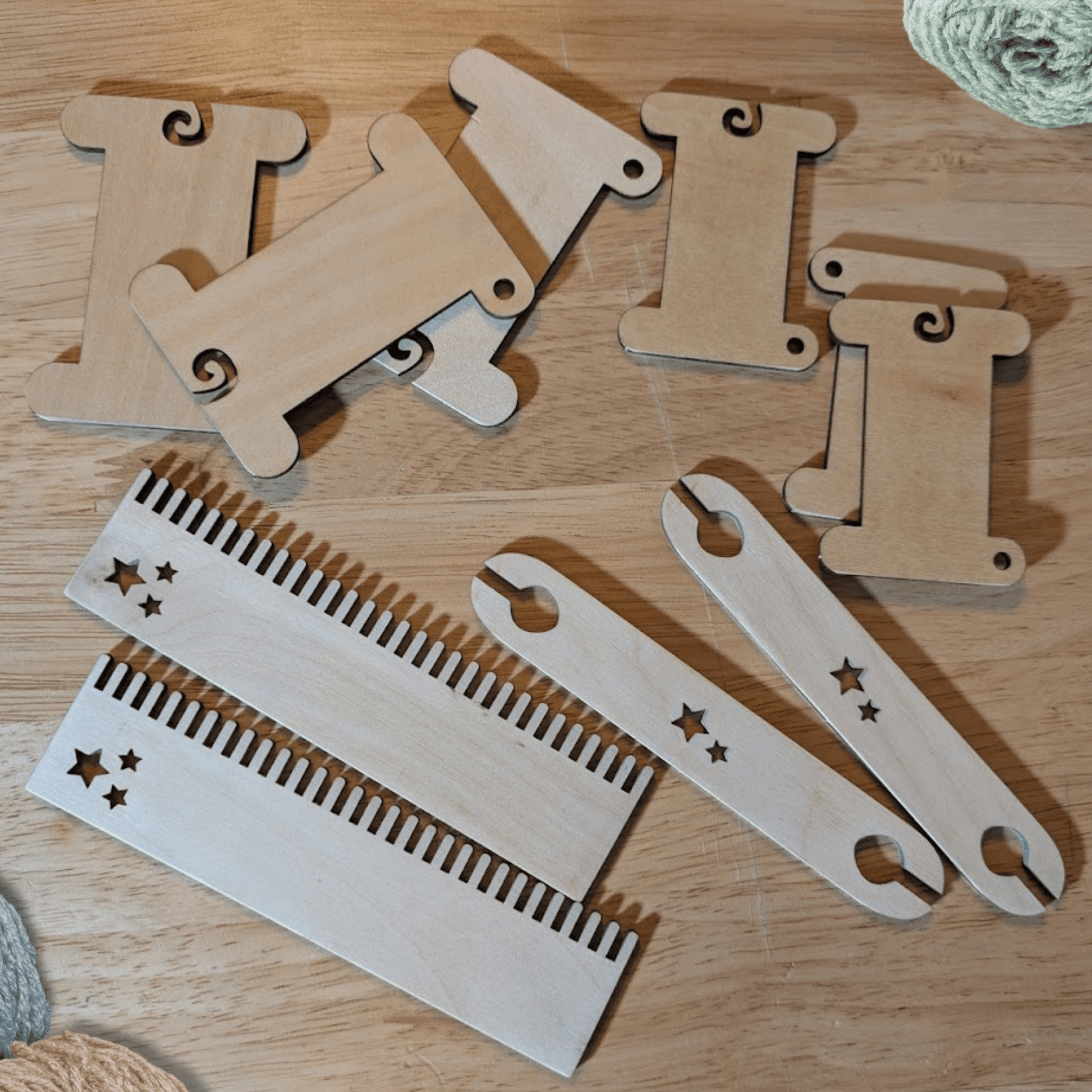 A photograph of some of the wooden weaving supplies we make. Wooden Bobbins / Spools - 3 Packs Art & Crafting Materials Raven King Crafts
